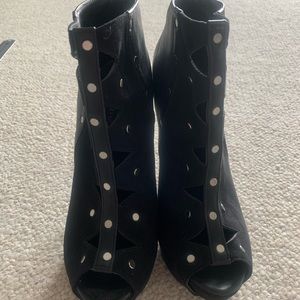 Black open toe booties with stud design